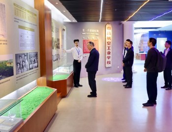 中国空气动力研究与发展中心科研总师袁先旭一行莅临校史馆参观